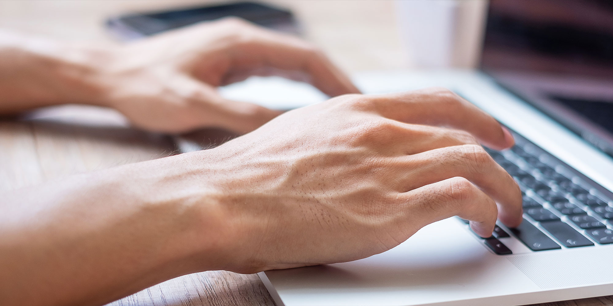man on computer creating blogs