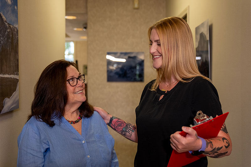 team member consulting with Patient