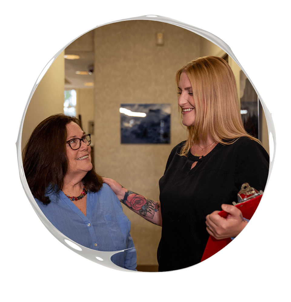 Team member smiling at doctor