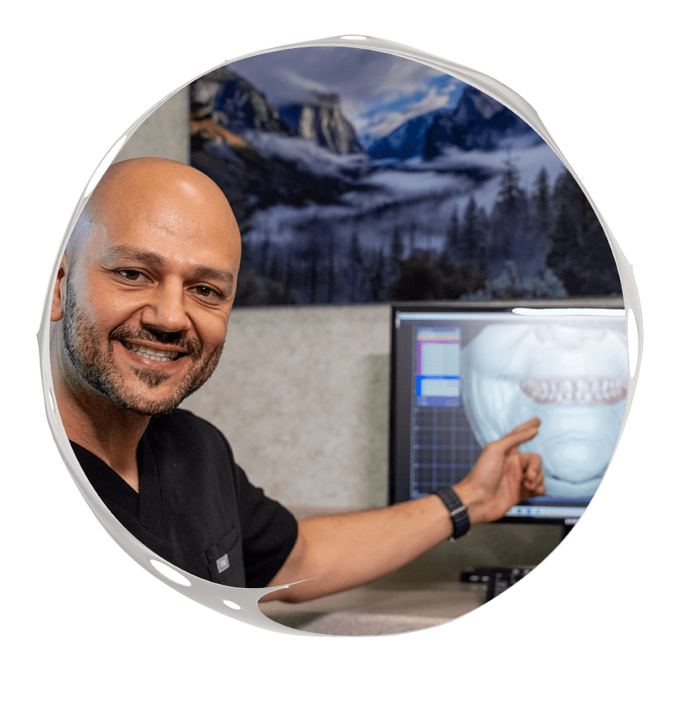 doctor going over a 3d scan of Patients teeth