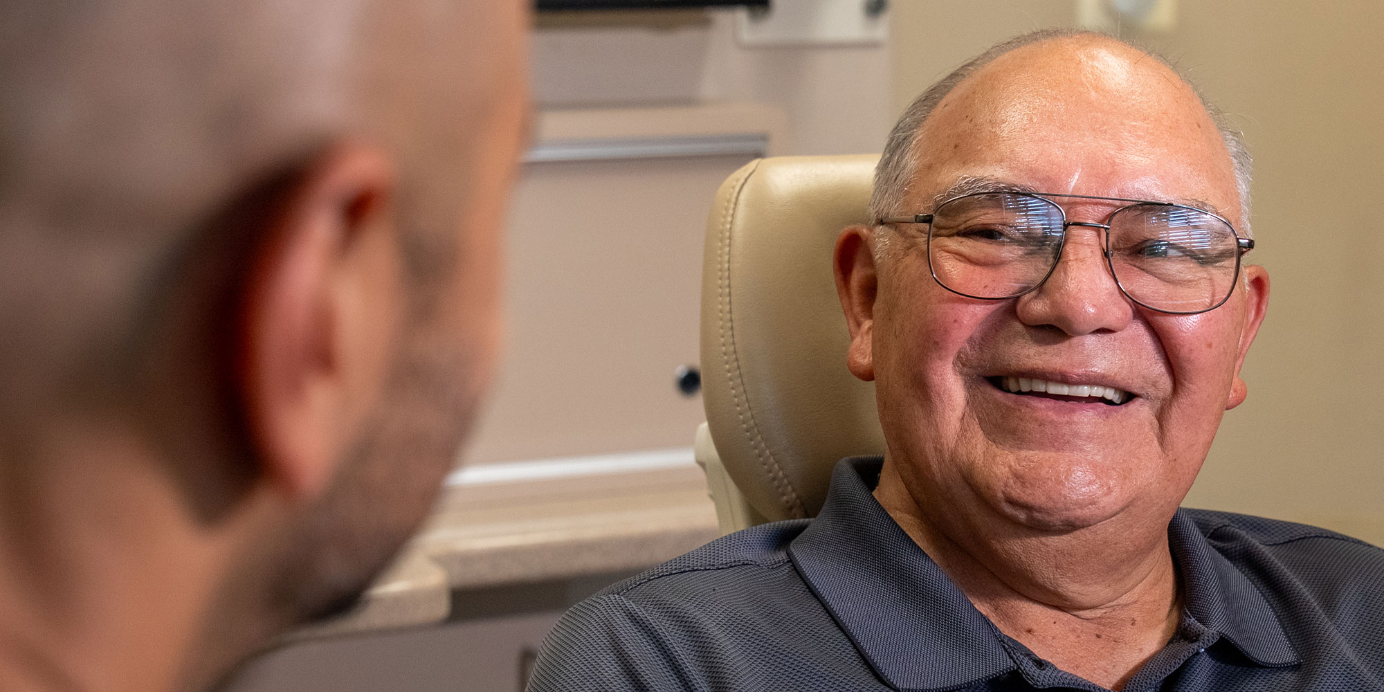 Patient SMiling at doctor